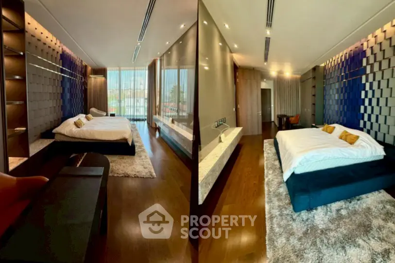 Luxurious modern bedroom with stylish decor and large windows offering natural light.