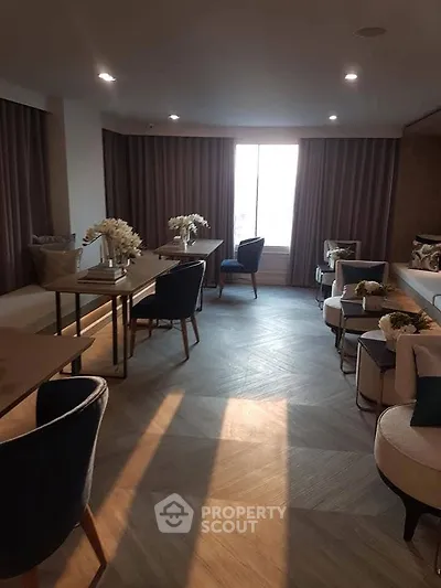Elegant modern living room with stylish furniture and natural light