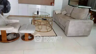 Spacious living room with modern furniture and elegant decor