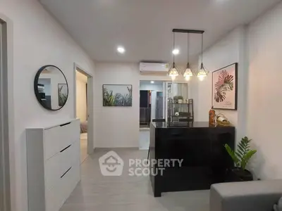 Modern living room with stylish decor and open layout in a contemporary apartment.