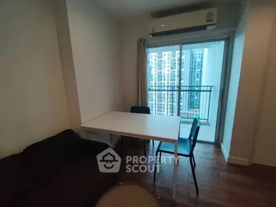 Modern living room with balcony view in urban apartment