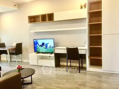 Modern living room with sleek furniture and built-in shelving, perfect for stylish urban living.