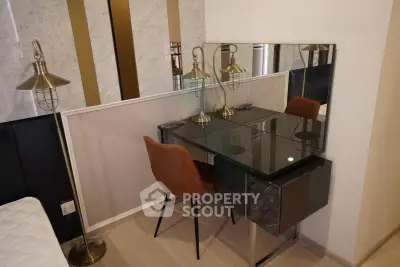 Stylish bedroom corner with modern desk and chair, perfect for a cozy workspace.
