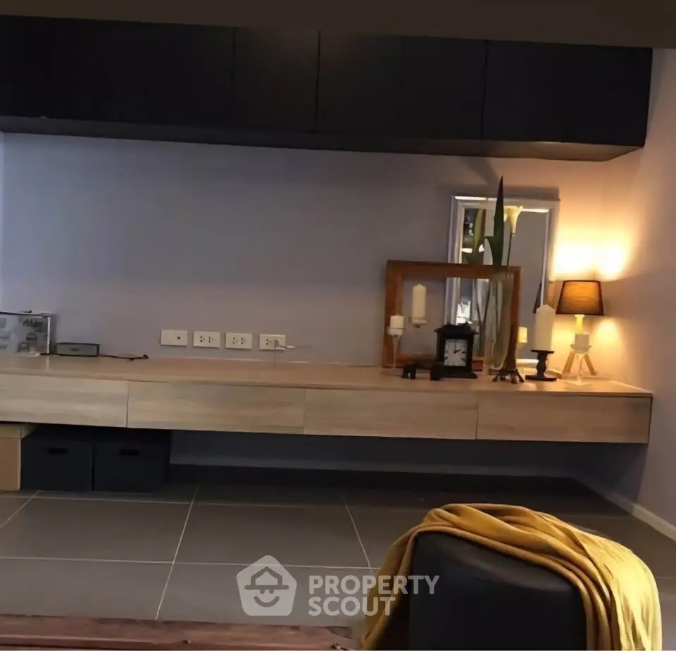 Modern study room with sleek wooden desk and ambient lighting