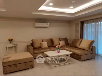 Luxurious living room with plush sectional sofa and elegant decor