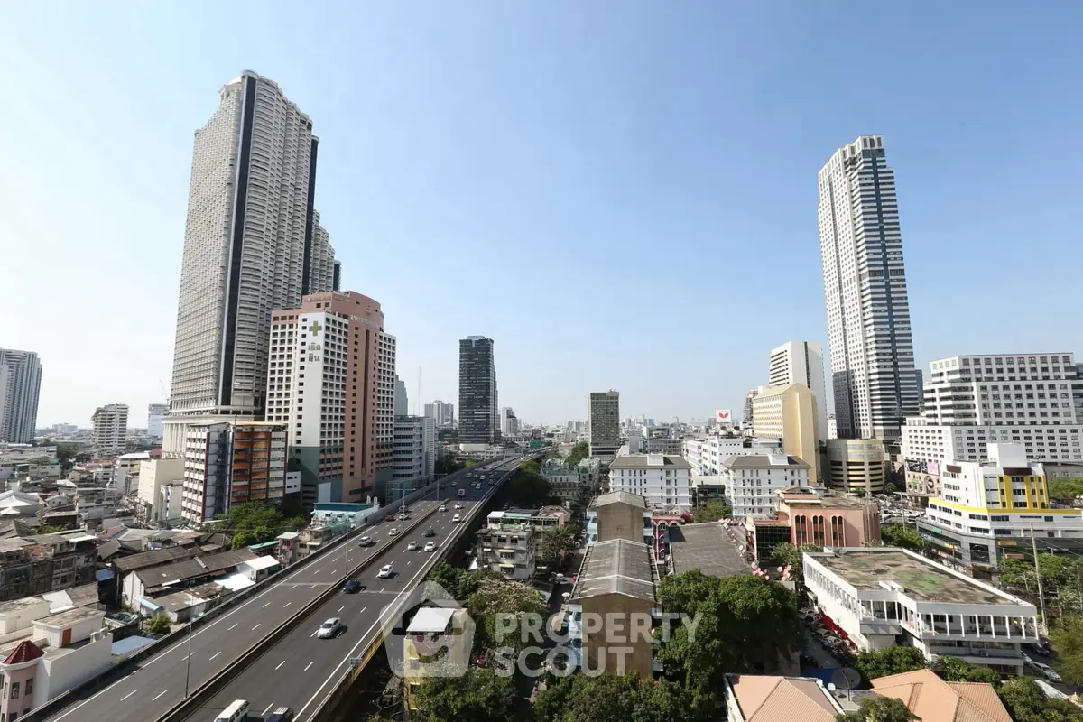 Stunning cityscape view showcasing high-rise buildings and bustling urban life.