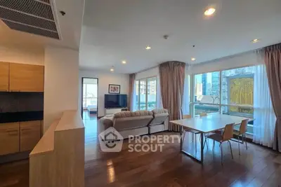 Spacious modern living room with open layout and city view