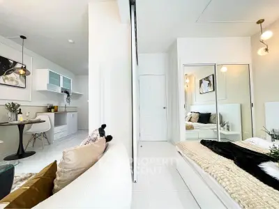 Modern studio apartment with stylish decor and cozy living area