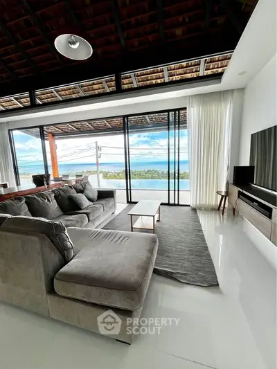 Luxurious living room with stunning ocean view and modern decor