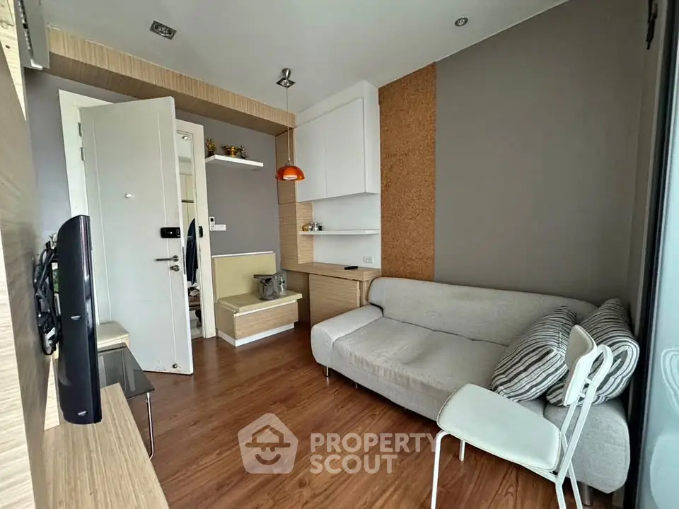 Modern living room with cozy sofa and stylish decor