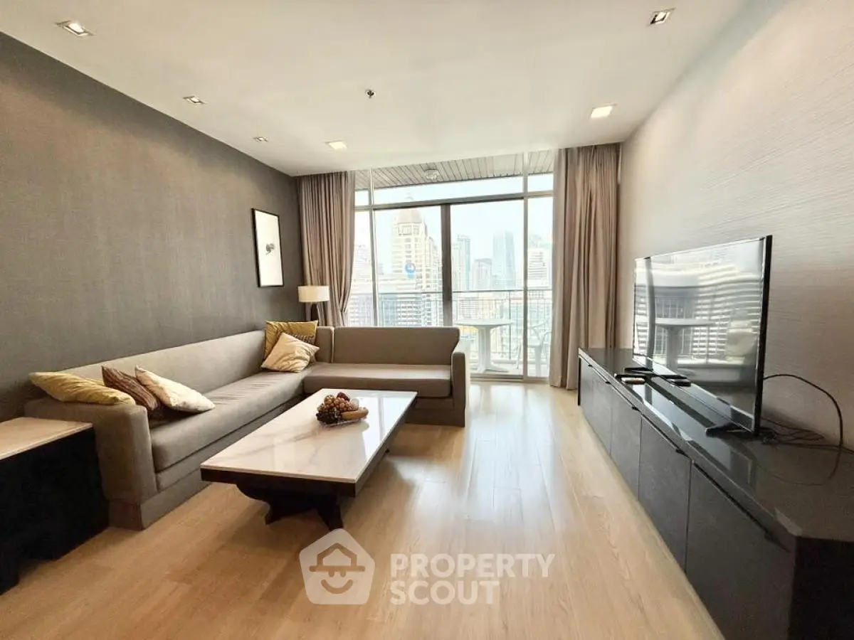 Spacious modern living room with city view and elegant decor