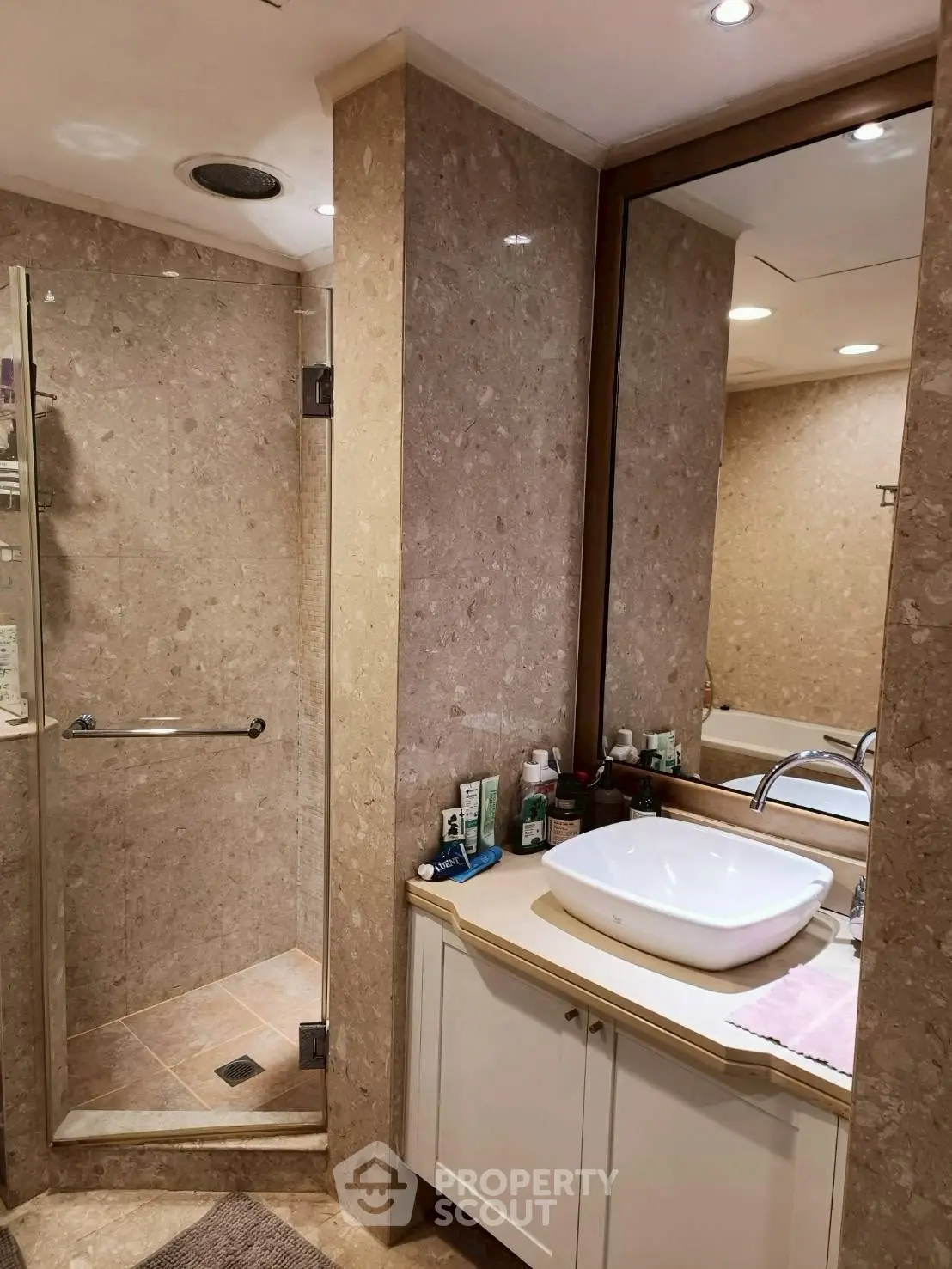 Elegant bathroom with modern fixtures and spacious shower area
