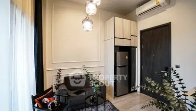 Modern living room with stylish decor and air conditioning in a cozy apartment.