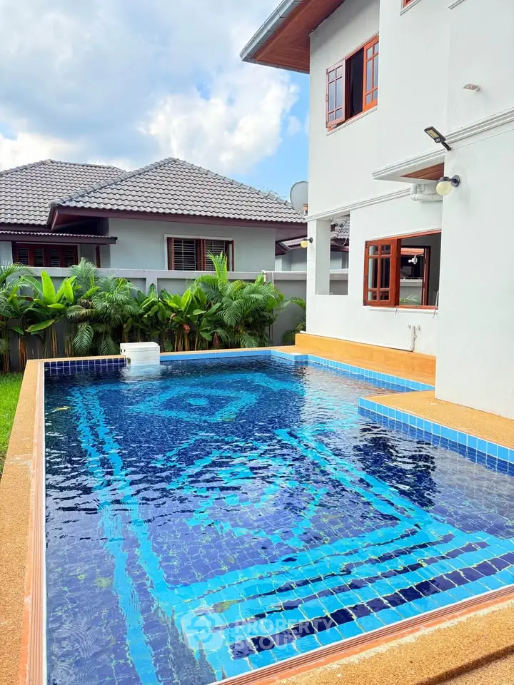 Stunning modern home with private pool and lush garden, perfect for luxury living.