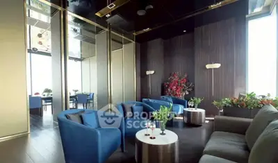 Luxurious modern living room with elegant blue chairs and stylish decor