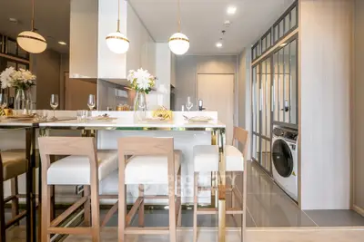 Modern kitchen with sleek design and integrated washing machine