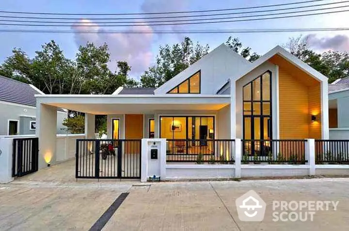 Modern single-story house with large windows and stylish facade