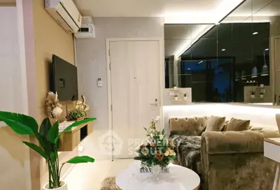 Luxurious living room with elegant decor and plush seating in modern apartment.