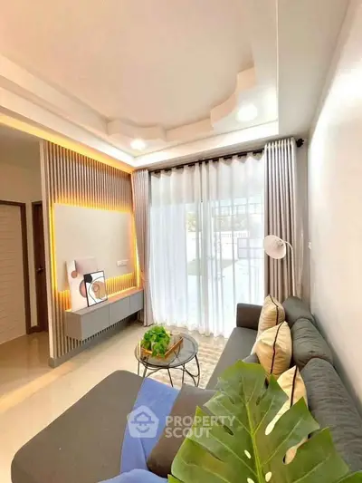 Modern living room with stylish lighting and cozy sofa