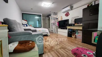 Cozy living room with modern decor and plush seating, perfect for relaxation.