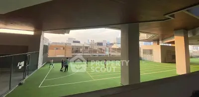 Spacious rooftop sports court with city views, perfect for active urban living.