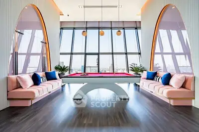 Luxurious modern living room with pool table and panoramic city views