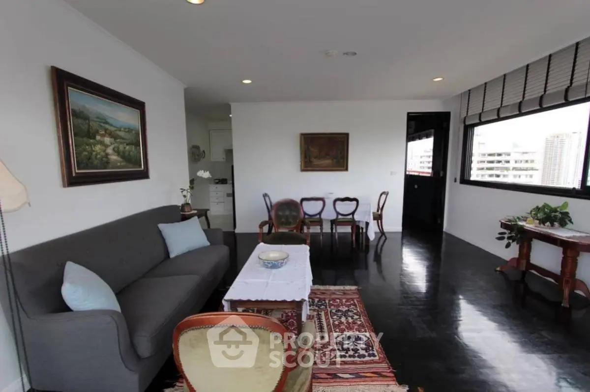 Spacious living room with elegant decor and city view