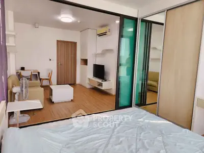 Modern studio apartment with open layout and stylish furnishings