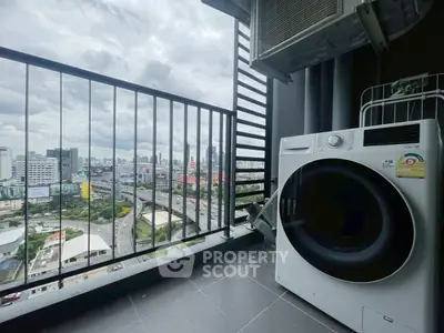 Modern balcony with city view and washing machine, perfect for urban living.
