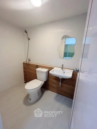 Modern bathroom with sleek fixtures and stylish tile design