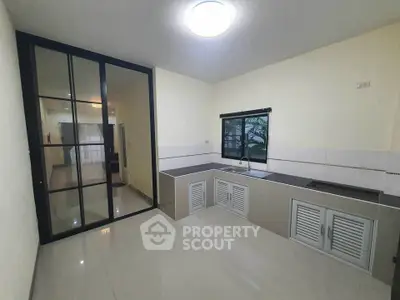 Modern kitchen with sleek design and ample storage space