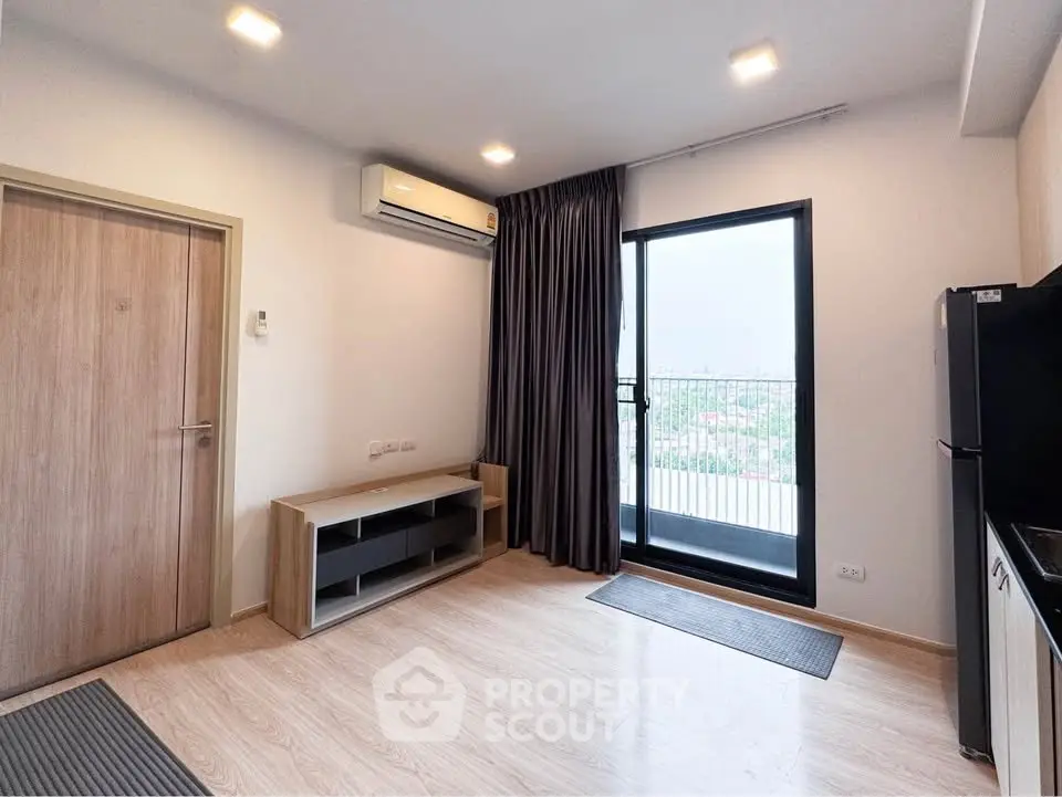 Modern apartment living room with balcony and city view
