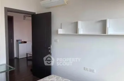 Modern bedroom with air conditioning and minimalist design in a stylish apartment.