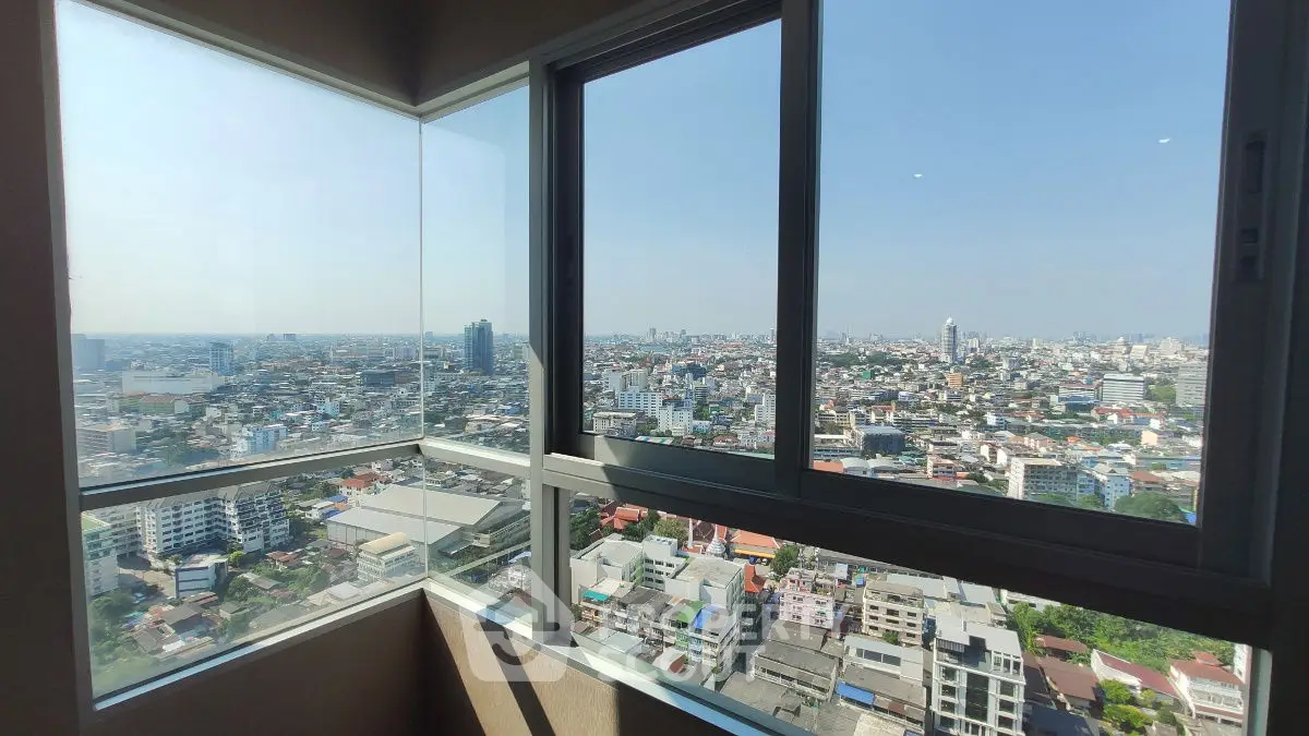 Stunning cityscape view from high-rise apartment window