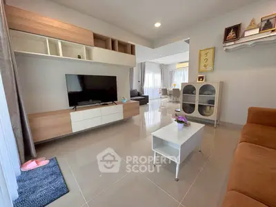 Spacious modern living room with sleek furniture and natural light