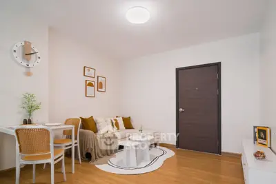 Cozy living room with modern decor and wooden flooring