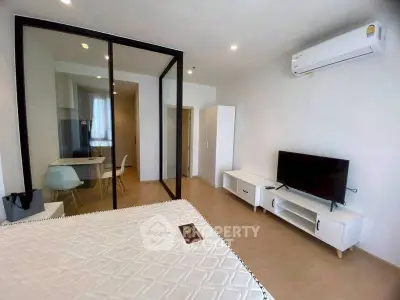 Modern studio apartment with sleek design and air conditioning