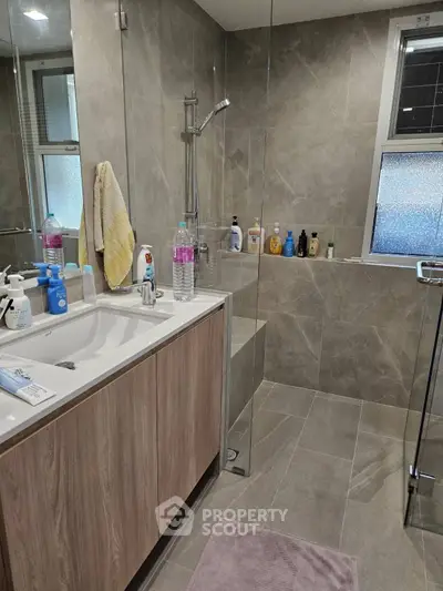 Modern bathroom with sleek design and glass shower enclosure