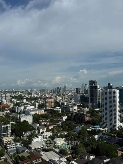 Stunning cityscape view showcasing modern skyscrapers and lush greenery, perfect for urban living enthusiasts.