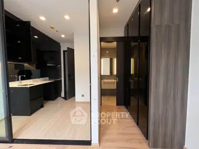 Modern apartment interior with sleek kitchen and bathroom design