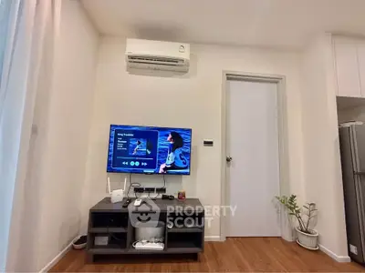 Modern living room with air conditioning and entertainment setup