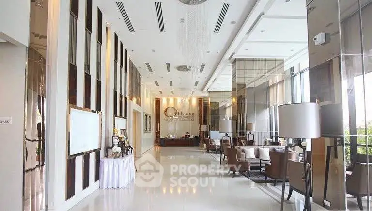Luxurious hotel lobby with elegant decor and high ceilings