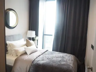 Cozy modern bedroom with plush bedding and elegant decor