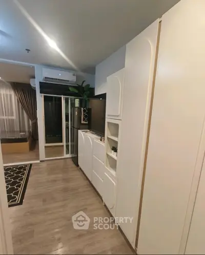 Modern living room with stylish decor and open layout, perfect for entertaining guests.