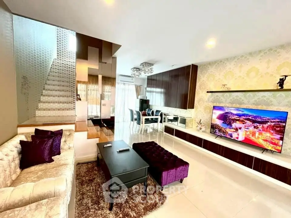 Luxurious modern living room with elegant decor and stylish staircase