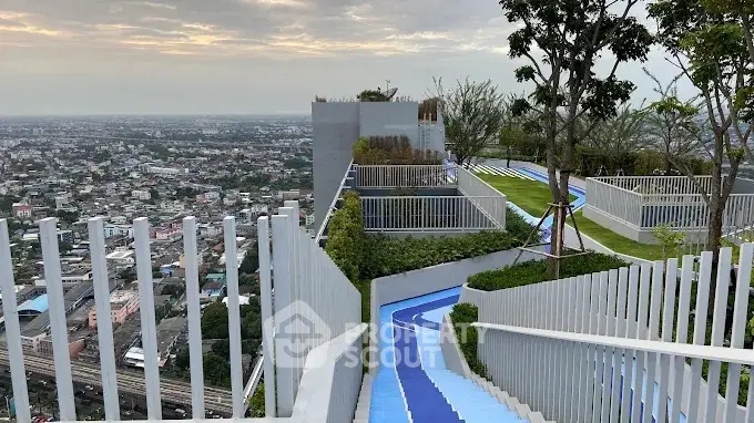 Stunning rooftop garden with panoramic city views and modern design.