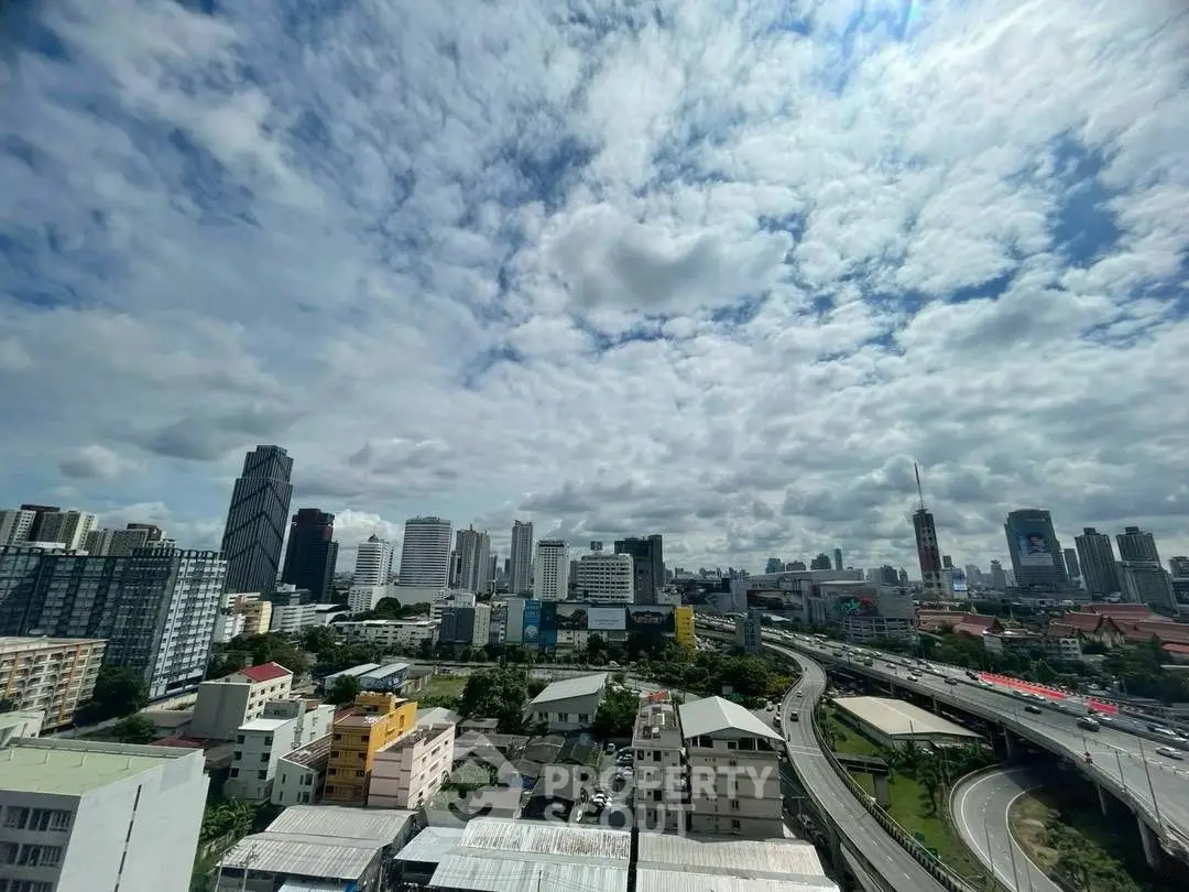 Stunning cityscape view with modern skyscrapers and highway, perfect for urban living enthusiasts.
