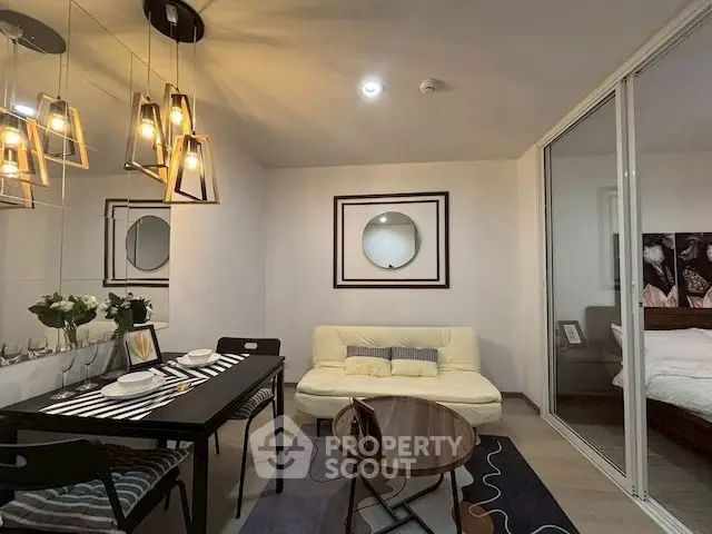 Stylish modern living room with elegant lighting and cozy seating area.