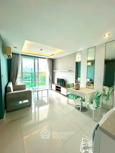 Modern living room with city view, sleek furniture, and elegant decor in a high-rise apartment.