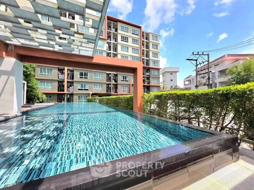 Luxurious condominium with stunning pool and modern architecture